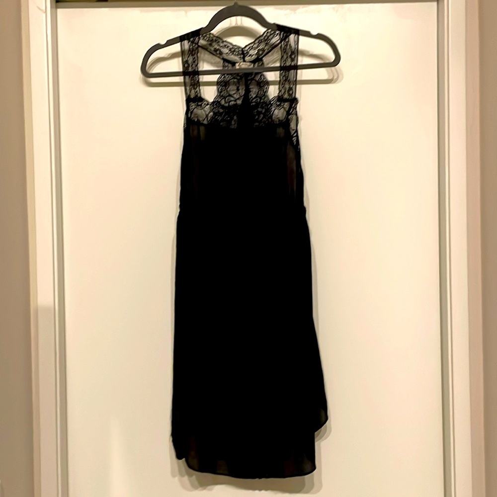 FP intimately in black.